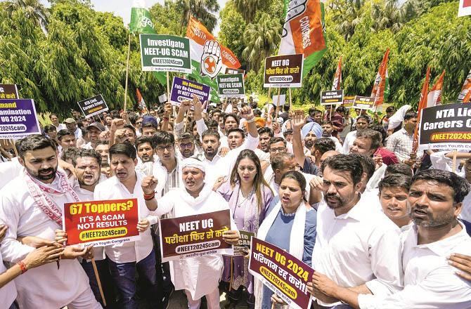 Youth Congress workers protesting against NET exam and results. Photo: PTI